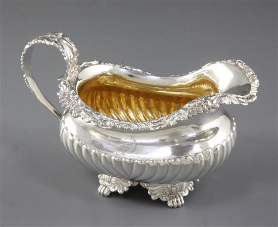 A George III demi fluted silver cream jug, by Joseph Angell I, Length 160mm Weight 7.2oz/225grms